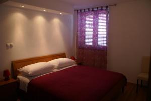 Postel nebo postele na pokoji v ubytování Apartment Adria Sun