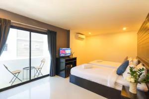 Кровать или кровати в номере AP Apartment