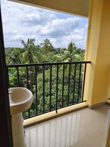 Balkón nebo terasa v ubytování Darshanam Inn