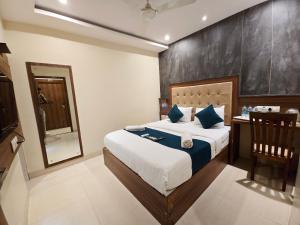 Postel nebo postele na pokoji v ubytování Hotel Amber Edition - Amber Palace