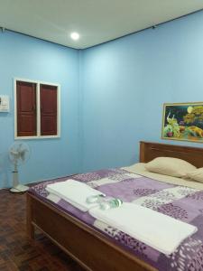 Postel nebo postele na pokoji v ubytování Anan guesthouse