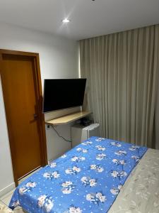 Телевизор и/или развлекательный центр в Diamond Flat Aparthotel Mont Blanc