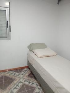 En eller flere senge i et værelse på Apartamento en Trinidad Flores