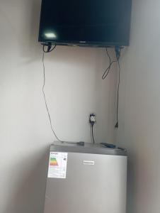 Et tv og/eller underholdning på Apartamento en Trinidad Flores