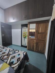 Kuchyň nebo kuchyňský kout v ubytování Pranavam Home Stay