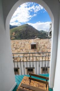 a view from the roof of a building with benches at Apartamento Coque -Cazorla in Cazorla