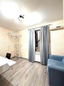 Χώρος καθιστικού στο 2 BR stylish apartment in the most Center of Tashkent