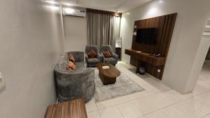 Et opholdsområde på فندق أبراج التاج