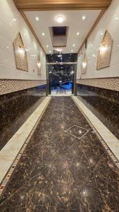 Lobbyen eller receptionen på فندق أبراج التاج