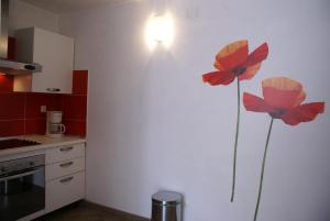 Kuchyň nebo kuchyňský kout v ubytování Apartment Adria Sun