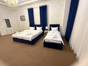 Postel nebo postele na pokoji v ubytování Velvet Hotel + 37 fotografií