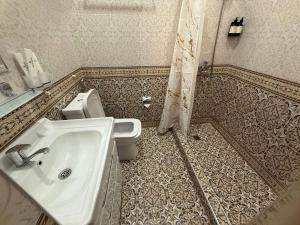 Koupelna v ubytování Velvet Hotel