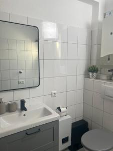 Phòng tắm tại Eröffnungspreise !!! Zentrales Apartment in Bad Zwischenahn