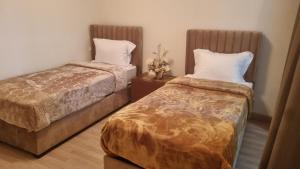 Giường trong phòng chung tại Perfect Stay Near Seafront with Beautiful City View +23 ảnh