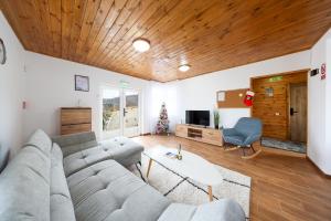 Телевизор и/или развлекательный центр в Casa Calatorului Rasnov