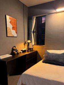 En eller flere senge i et værelse på Side Hostel 赛德青旅 太阳广场A座806室