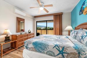 En eller flere senge i et værelse på Kona Plaza#409 + 35 billeder