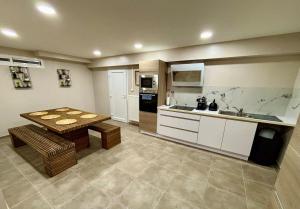 Η κουζίνα ή μικρή κουζίνα στο Le Cocon Vert +7 φωτογραφίες