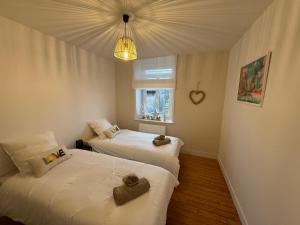 Postel nebo postele na pokoji v ubytování Le Wim Break, Centre et Mer à 2 pas