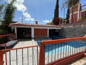 Bazén v ubytování IPGO Una casa para relajarse nebo v jeho okolí