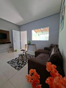 Et opholdsområde på CASA DE TEMPORADA NOVA E COMPLETA- ReFÚGIO