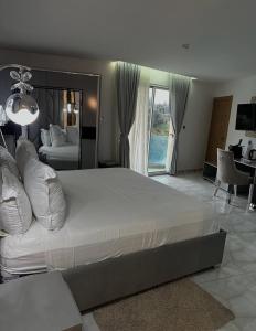 Postel nebo postele na pokoji v ubytování HOTEL Diar Jenna + 4 fotografie