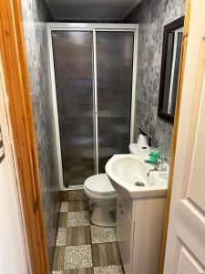 Koupelna v ubytování Casa familiar