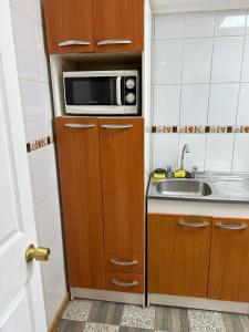 Kuchyň nebo kuchyňský kout v ubytování Casa familiar