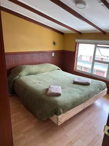 Postel nebo postele na pokoji v ubytování Casa familiar