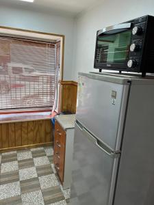 Kuchyň nebo kuchyňský kout v ubytování Casa familiar + 8 fotografií