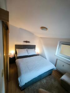 Ένα ή περισσότερα κρεβάτια σε δωμάτιο στο Hills View Apartment