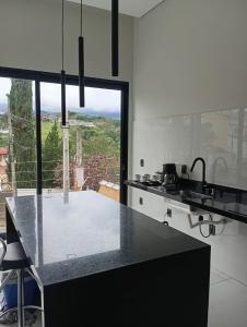 Køkken eller tekøkken på Casa Bela Vista + 9 billeder