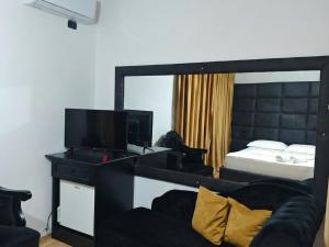 Postel nebo postele na pokoji v ubytování City Urban Hotel