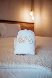 En eller flere senge i et værelse på Ecohotel Tierra de Agua