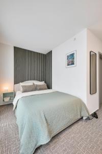 En eller flere senge i et værelse på Neubau - Citynah & Modern in Hamburg Niendorf