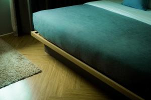 Postel nebo postele na pokoji v ubytování Quies Hotel