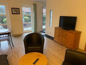 Televiisor ja/või meelelahutuskeskus majutusasutuses Kleines Ferienhaus in Lauenburg