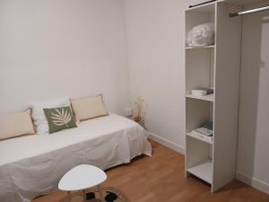 Postel nebo postele na pokoji v ubytování Charmante maison meublée à louer à Sainte-Clotilde