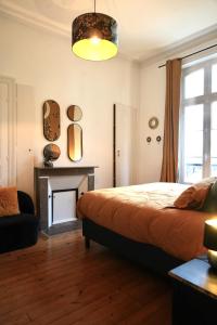 Postel nebo postele na pokoji v ubytování Domaine des Monts de la Baie + 26 fotografií