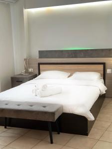 En eller flere senge i et værelse på Central appartment 2 with parking