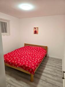 Postel nebo postele na pokoji v ubytování Apartman Keka