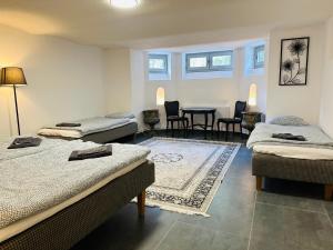 Ένα ή περισσότερα κρεβάτια σε δωμάτιο στο Villa i Fridhem centralt i Malmö