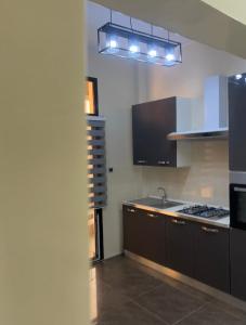 Nhà bếp/bếp nhỏ tại Residence Ndeye Ngouye +21 ảnh