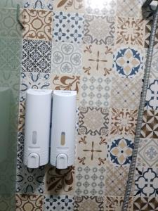 a pair of speakers sitting on top of a wall at Riad el wazania in Rabat +107 photos