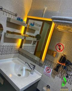 Phòng tắm tại Hojin Hotel