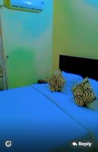 Ένα ή περισσότερα κρεβάτια σε δωμάτιο στο Sentinels Apartment and Suites by STEFANOS