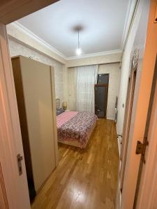 Postel nebo postele na pokoji v ubytování Kristal Abşeron