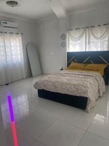 Ένα ή περισσότερα κρεβάτια σε δωμάτιο στο Zebra mark homes