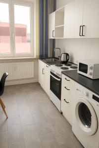 Kuchyň nebo kuchyňský kout v ubytování Nice stay long term