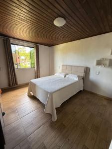 Postel nebo postele na pokoji v ubytování Casa com piscina no Campo D'Una + 22 fotografií